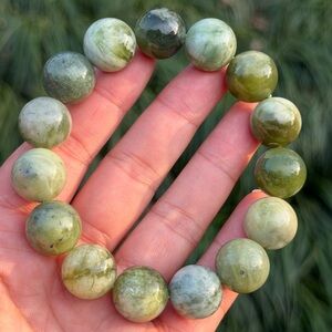 14mm stretchable natural green Xiuyu jade bracelet 1179